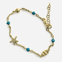 Goldenes Armband mit Seestern, Muschel und blauen Perlen, maritimer Schmuck