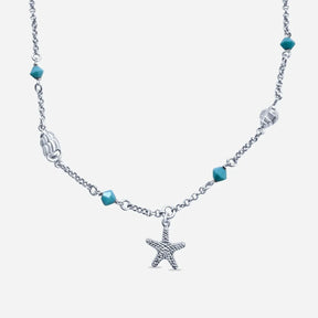 Silberkette mit Seestern-Anhänger, türkisfarbenen Perlen und maritimen Details